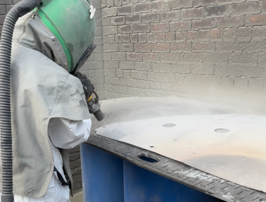 Blast Cleaning of Metal Shields at Wipac
