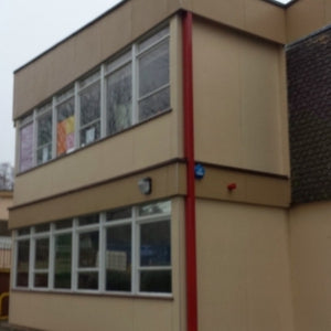 Cleaning Rendered Walls, Softwashing & Algae Removal at Penygarn Primary School in Pontypool, Wales