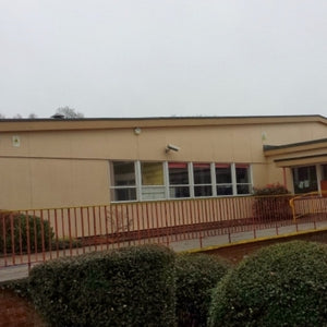 Cleaning Rendered Walls, Softwashing & Algae Removal at Penygarn Primary School in Pontypool, Wales